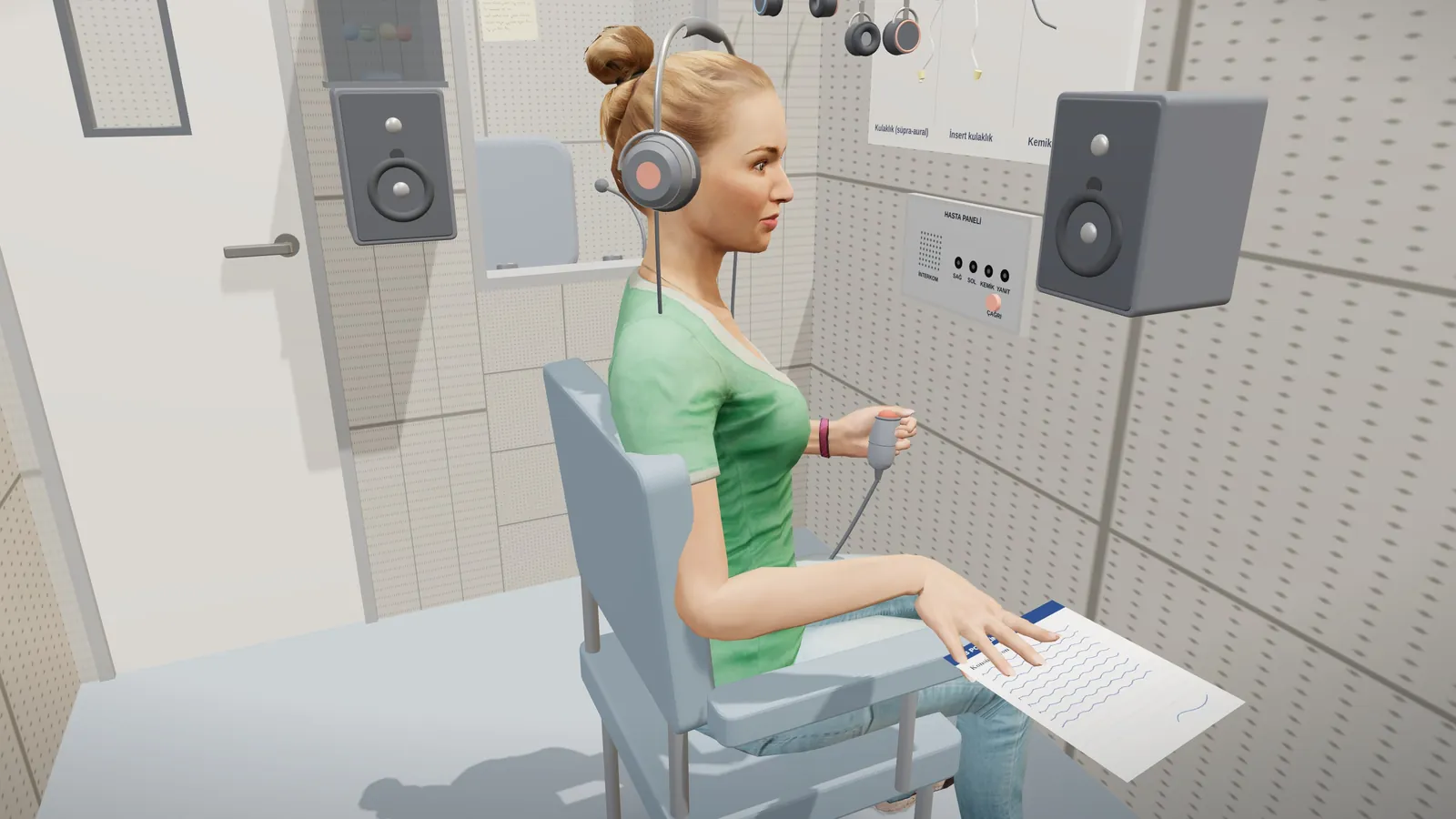 The patient in the test room wearing headphones, holding the response button.